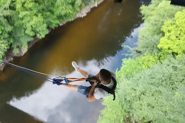 a person riding skis down a river
