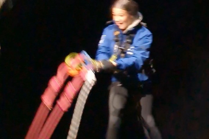 a person hitting a ball with a racket